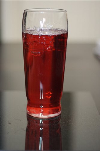 A glass of cranberry juice
