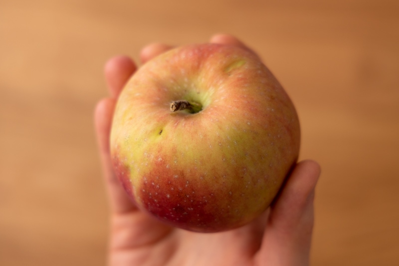 Apple in hand