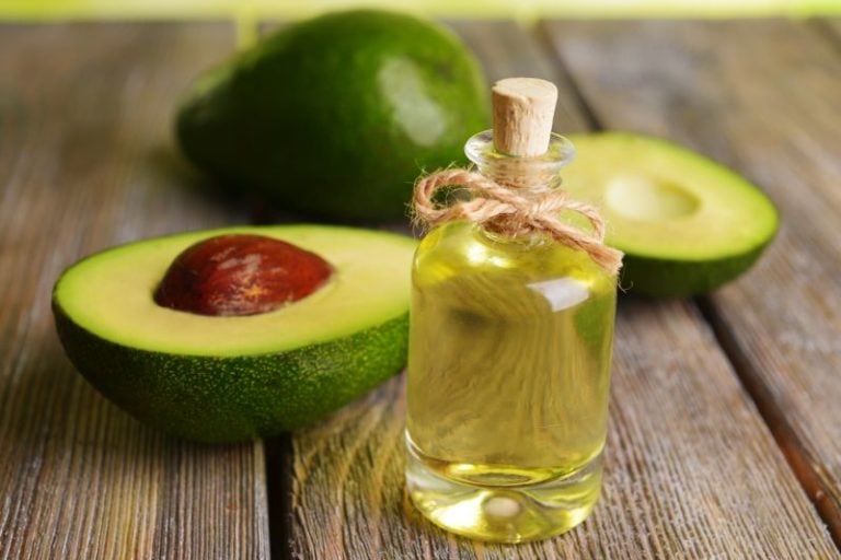 Avocado oil and avocado halves