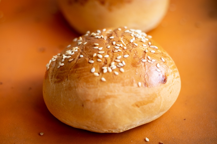 Baked bread rolls with sesame seeds on top