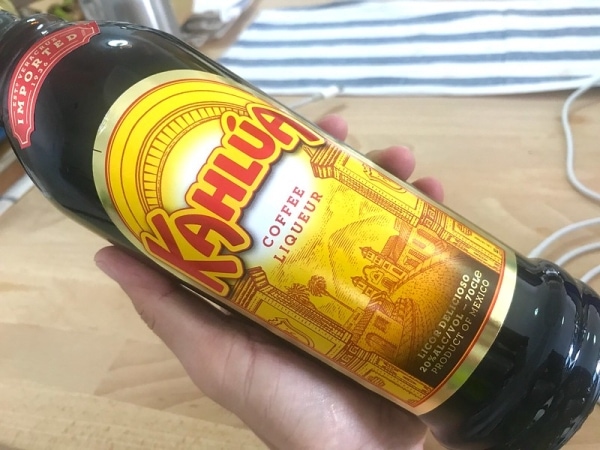 Bottle of Kahlua in hand