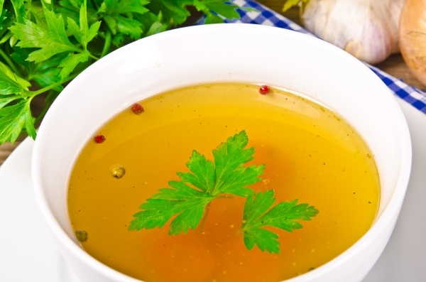 Broth in a white bowl