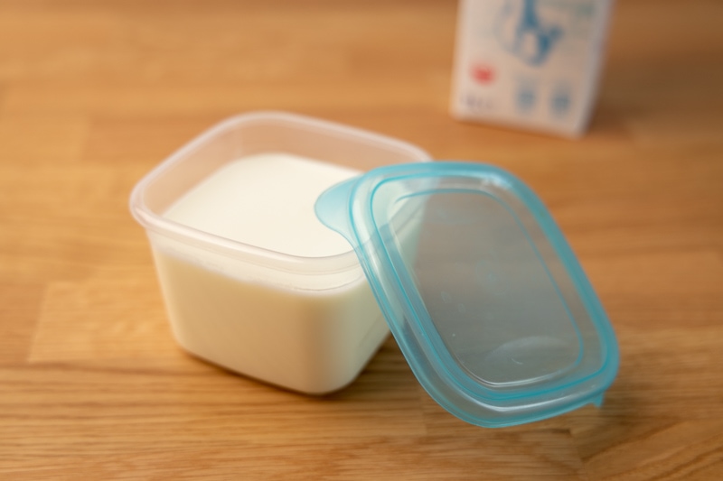 Buttermilk in a plastic container
