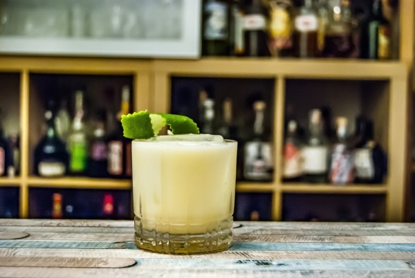 Buttermilk margarita garnished with lime skin