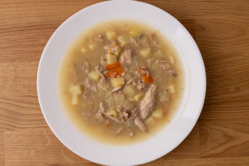 Cabbage soup with potatoes and chicken