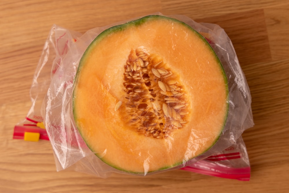 Cantaloupe half in a freezer bag