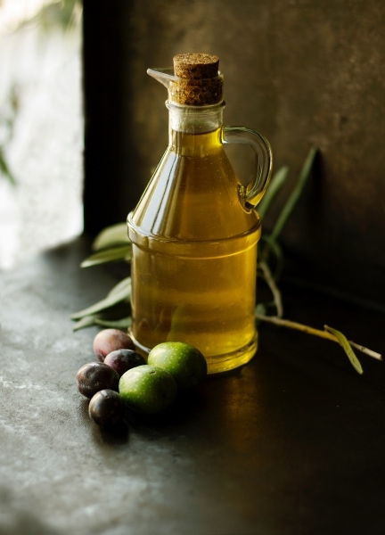 Cordked glass bottle of olive oil