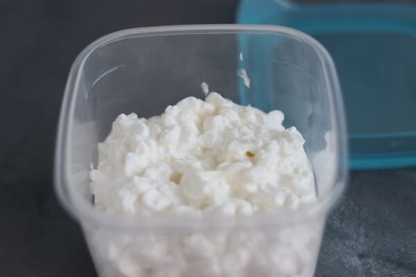 Cottage cheese in container ready for freezing