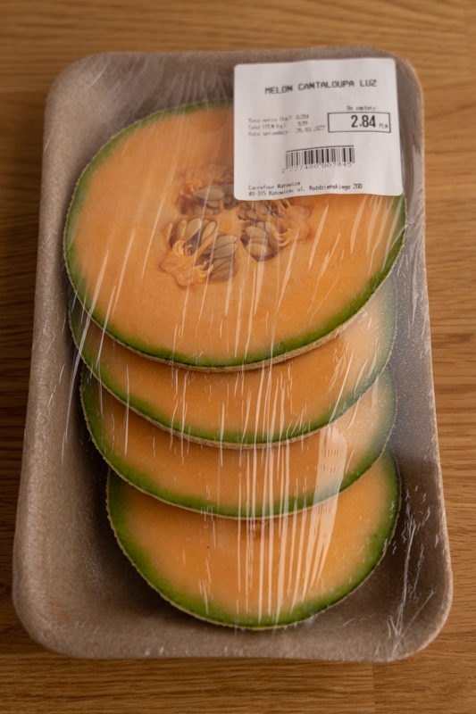 Store-bought cut cantaloupe wrapped in foil