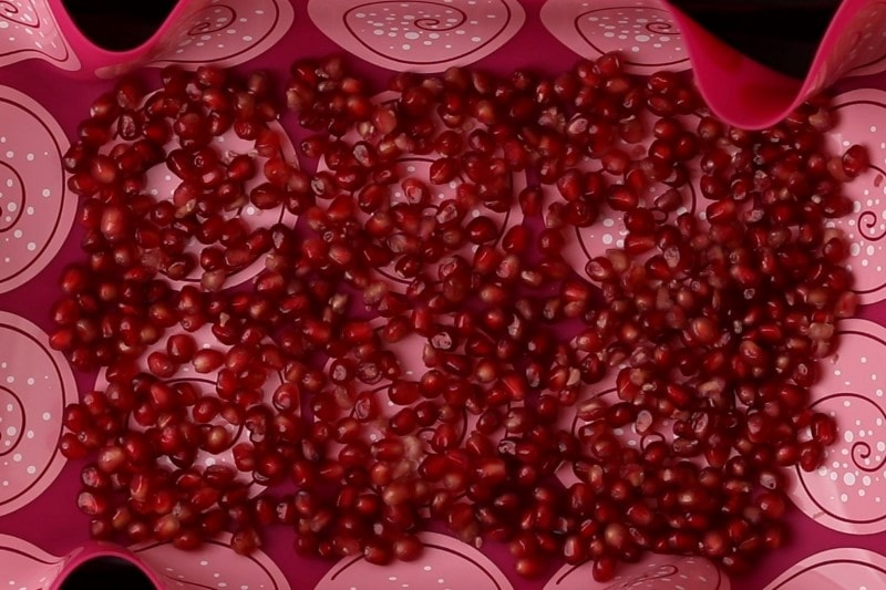 Dry pomegranate seeds ready for freezing