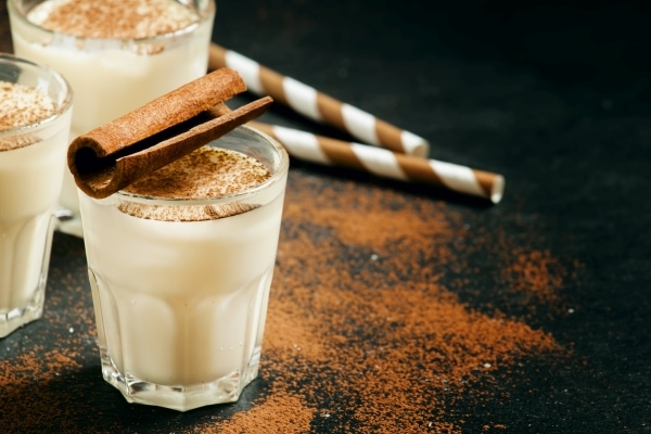 Eggnog  with milk, rum, and cinnamon