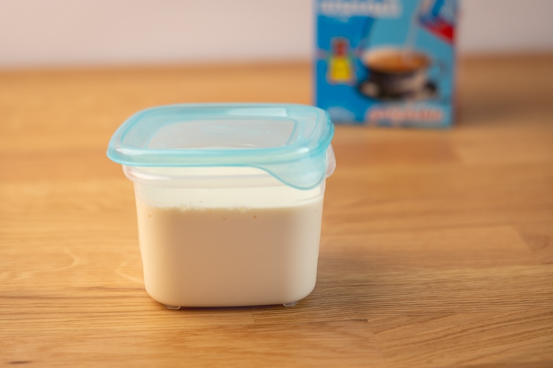 Evaporated milk in a container