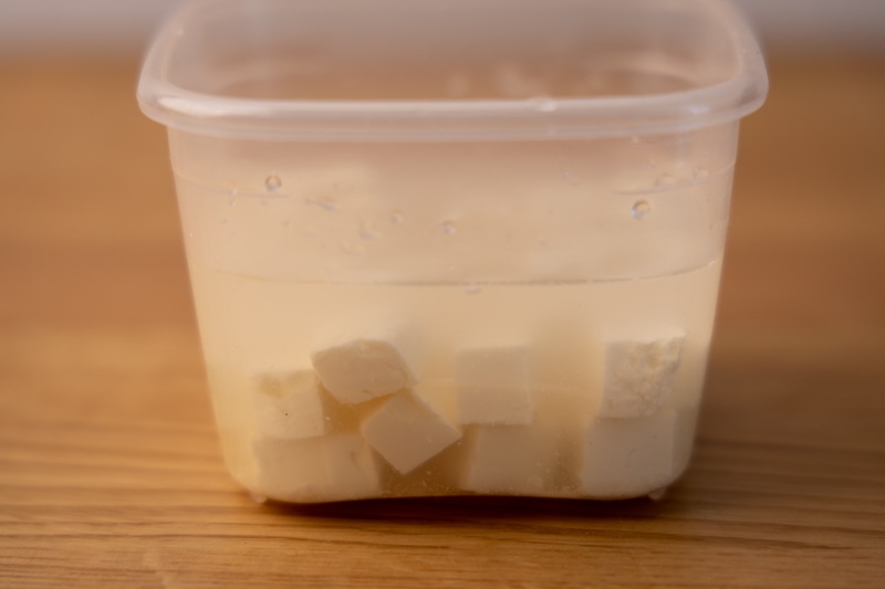 Feta cubes in brine