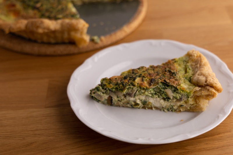 Feta spinach mushrooms quiche slice