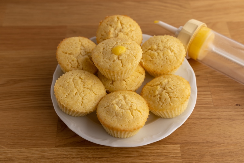 Filling cupcakes with lemon curd