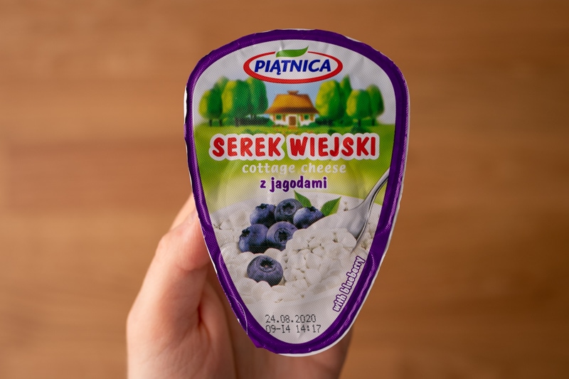 Flavored cottage cheese in hand