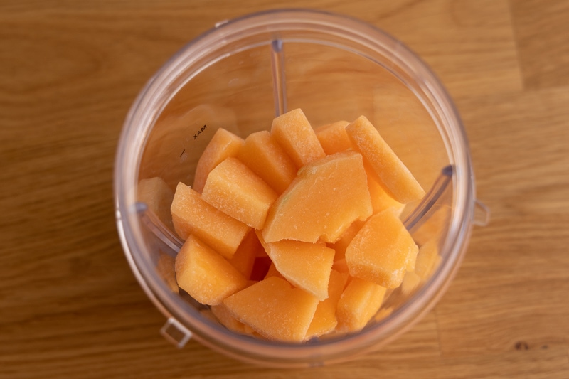 Frozen cantaloupe in a blender