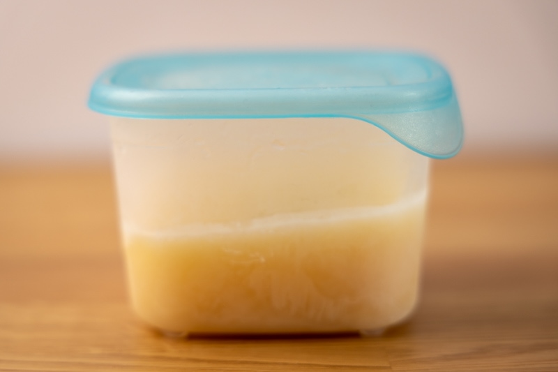 Frozen evaporated milk in a container