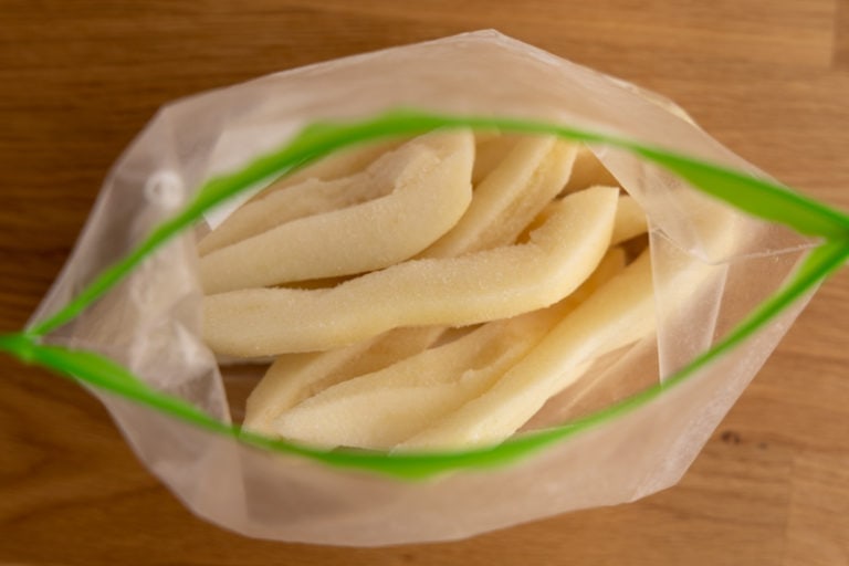 Frozen pear quarters in a bag