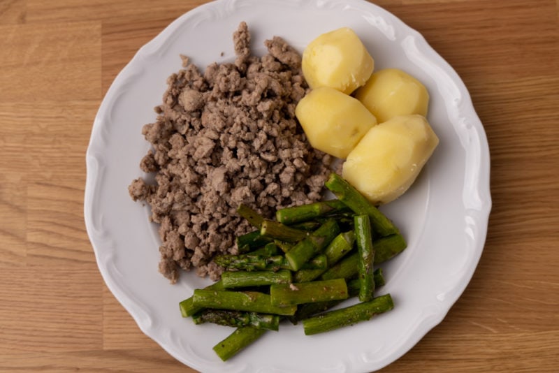 Ground pork potatoes and asparagus