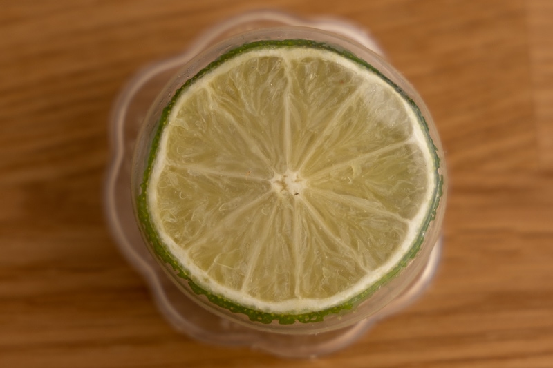 Halved lime in a silicone food saver