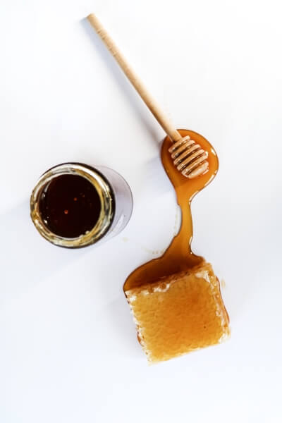 Honey on a table and a jar of honey