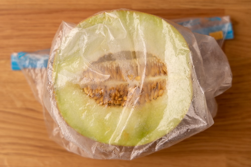 Honeydew half in a freezer bag