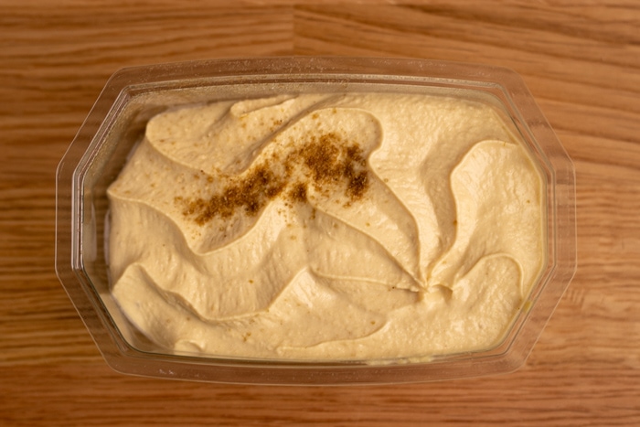 Hummus in a plastic box