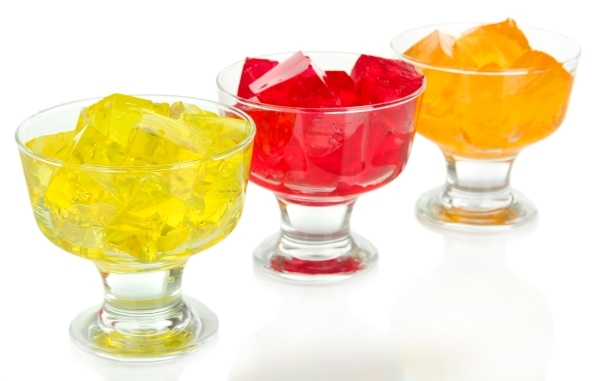 Tasty jelly cubes in bowls