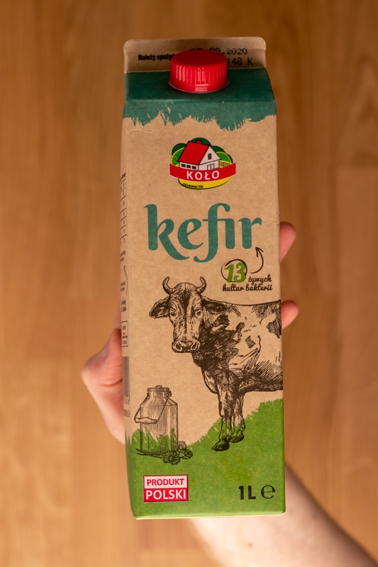 Kefir carton in hand