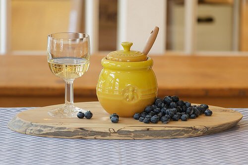 Mead in glass, and a jar of honey