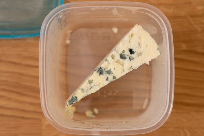 Leftover blue cheese in a container