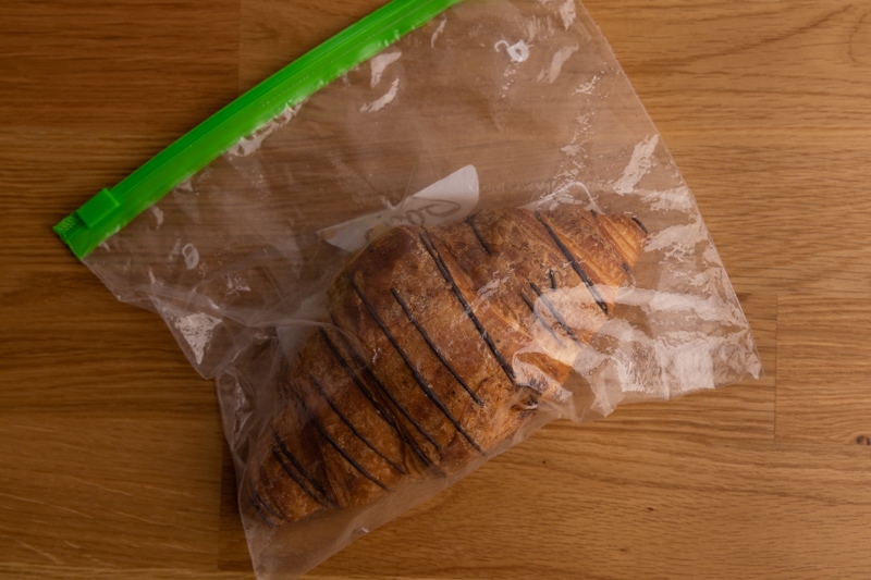 Leftover croissant in a plastic bag