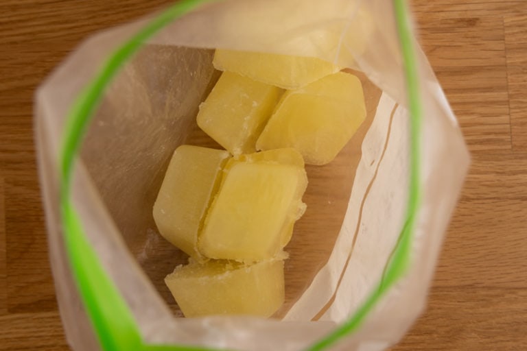 Lemon juice cubes in a freezer bag
