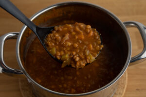 Lentil soup on a ladle