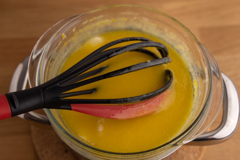 Mixing butter into lemon curd