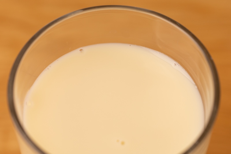 Oat milk in a glass: closeup
