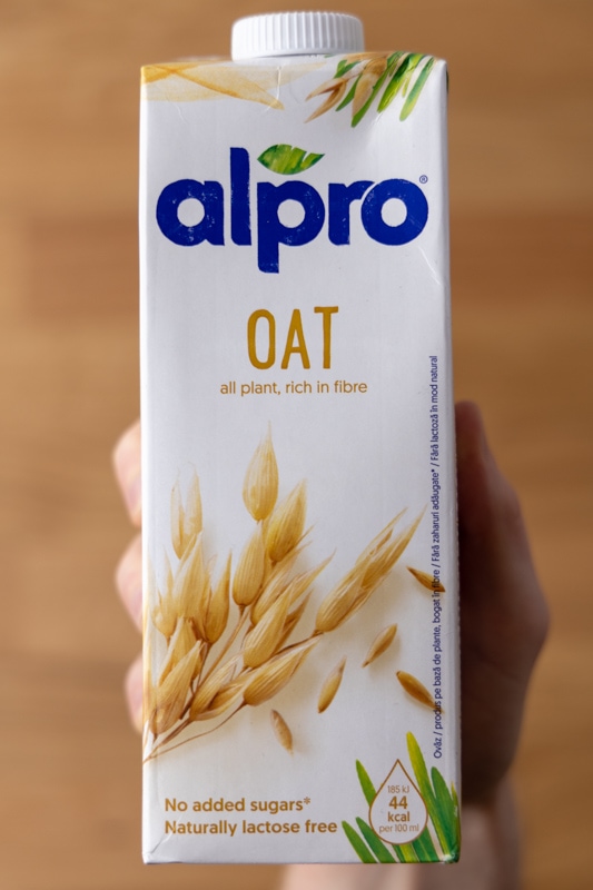 Oat milk in hand