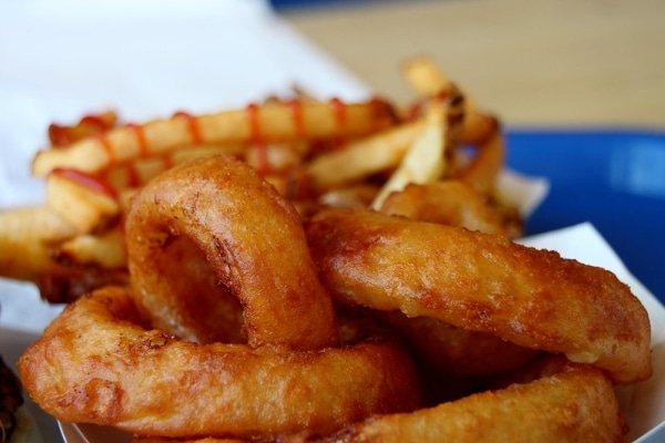 Onion rings fried in peanut oil