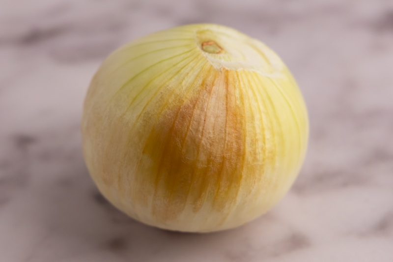 Onion spoiling outer layer