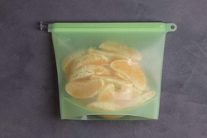 Orange segments packed for freezing