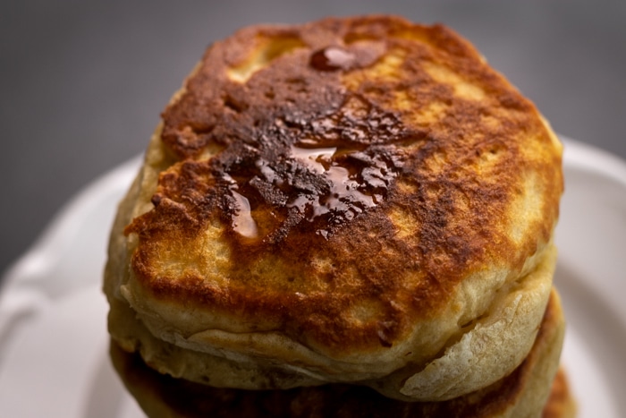 Pancake topped with maple syrup