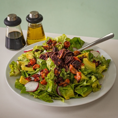 Pecan avocado salad with balsamic vinegar and olive oil sauces