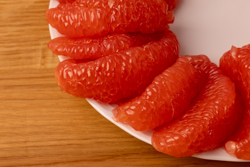 Peeled grapefruit on a plate