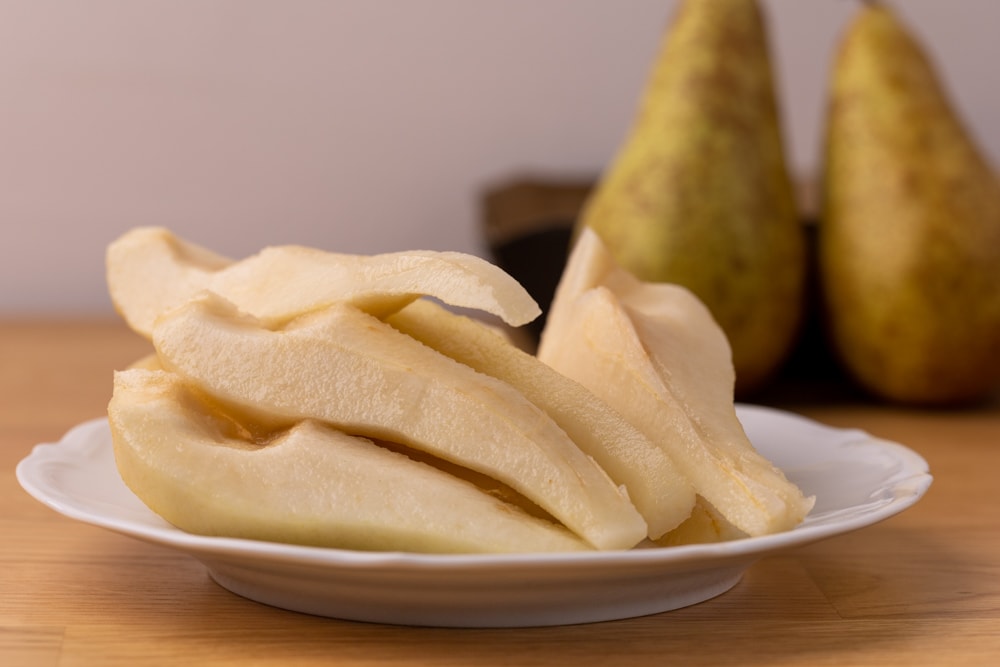 Peeled pears on a plate