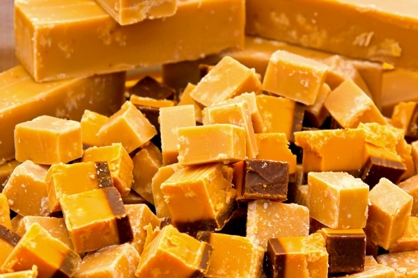 A pile of cubes of caramel fudge