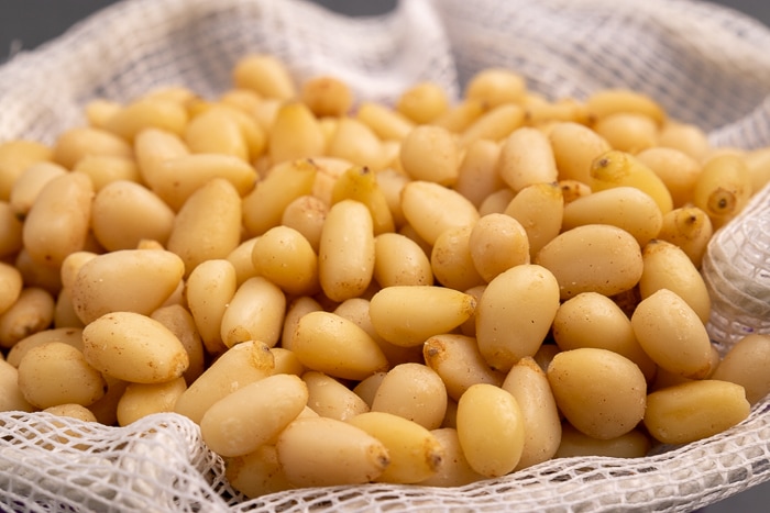 Pine nuts in a mesh bag