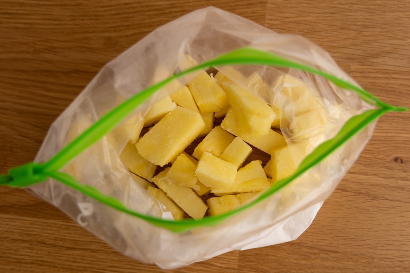 Pineapple chunks in a freezer bag