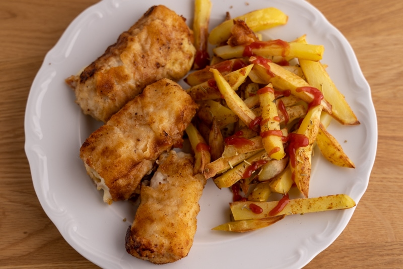 Potato fries with ketchup for dinner