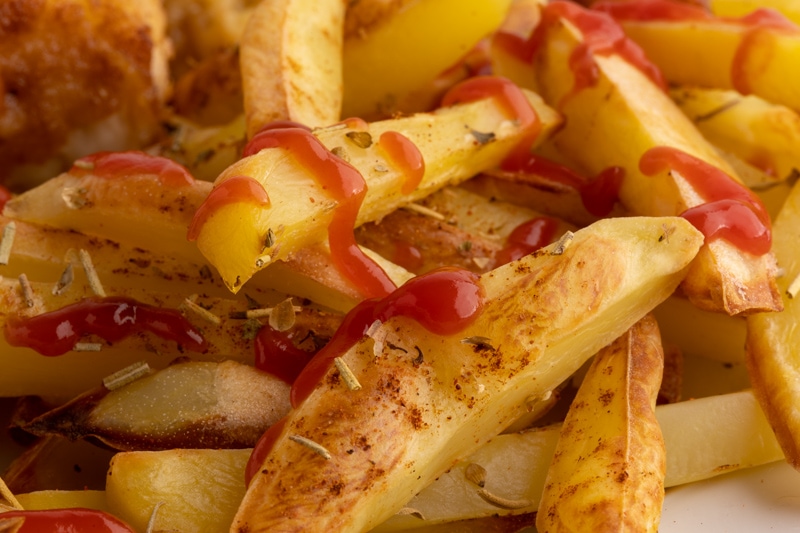 Potato fries with ketchup